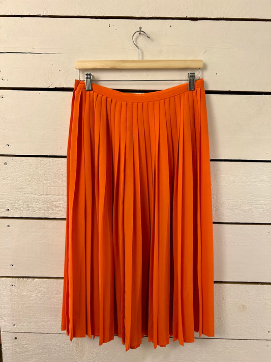 Jupe plissée orange